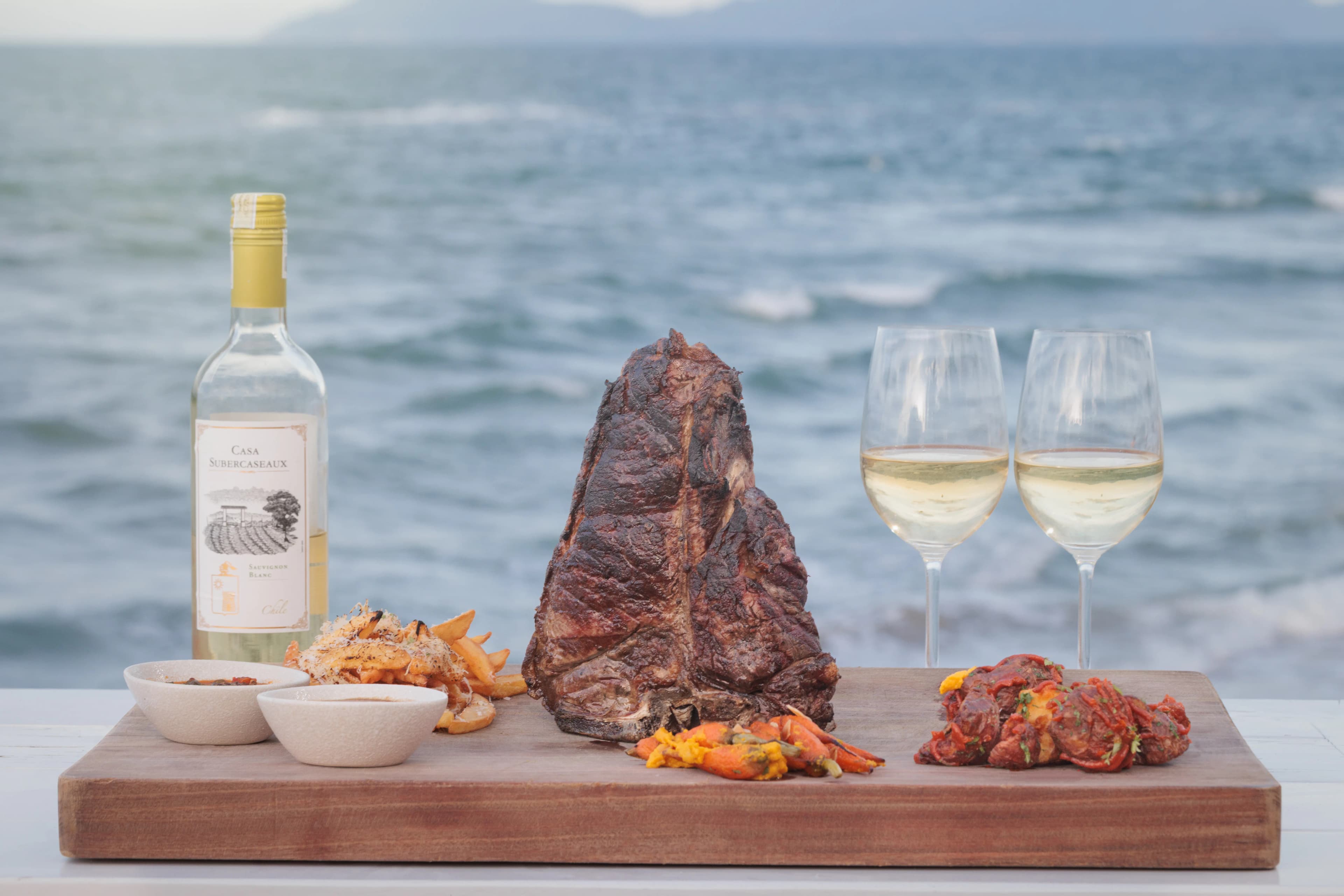 Bone-in Ribeye steak with wine and sauce